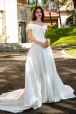 Waist-Enhancing Satin Bridal Gown with Bow Design