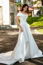 Waist-Enhancing Satin Bridal Gown with Bow Design