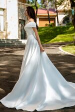 Waist-Enhancing Satin Bridal Gown with Bow Design