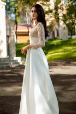 Pearlescent Satin Bridal Gown with Beaded Lace Neckline