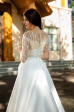 Pearlescent Satin Bridal Gown with Beaded Lace Neckline