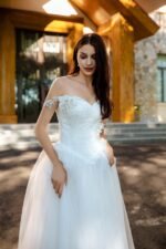 Vintage-Inspired Wedding Gown with Lace Floral Appliqué