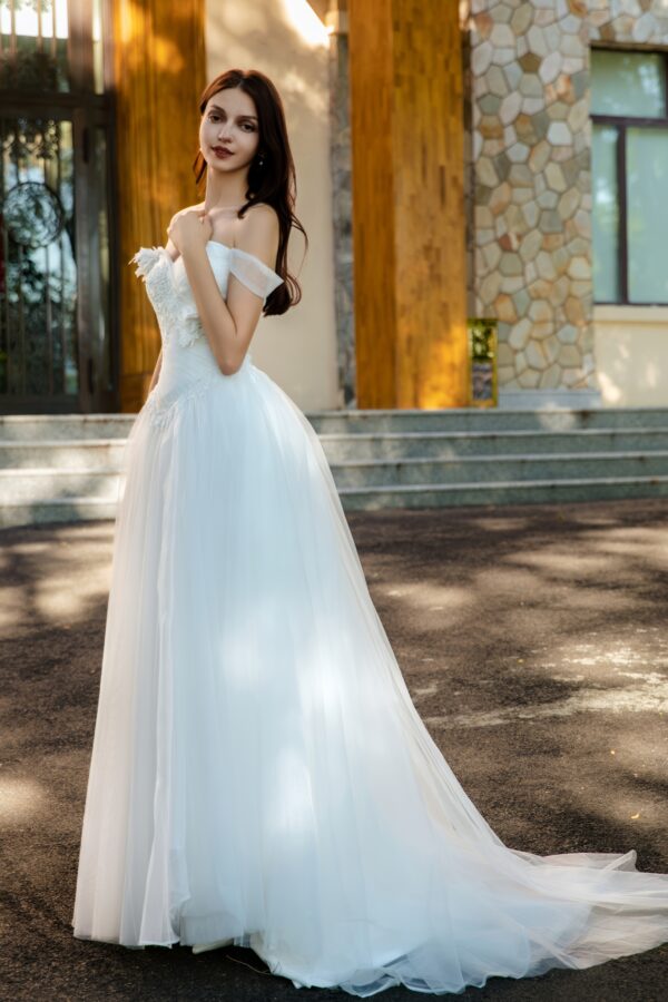 Vintage-Inspired Wedding Gown with Lace Floral Appliqué