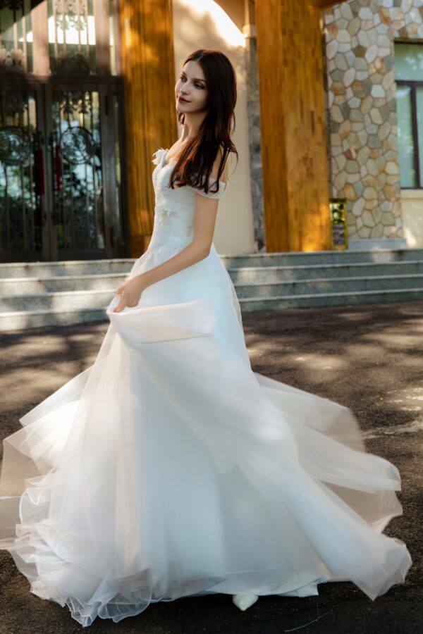 Vintage-Inspired Wedding Gown with Lace Floral Appliqué