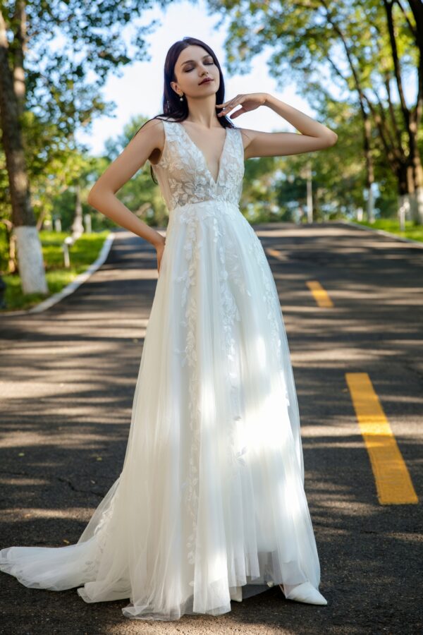 Effortless Grace Wedding Gown with V-Neckline and Ruched Bodice