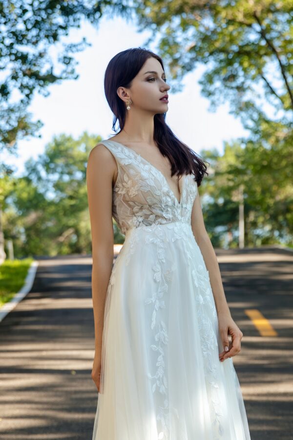 Effortless Grace Wedding Gown with V-Neckline and Ruched Bodice