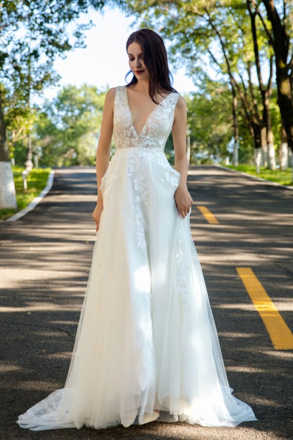 Effortless Grace Wedding Gown with V-Neckline and Ruched Bodice