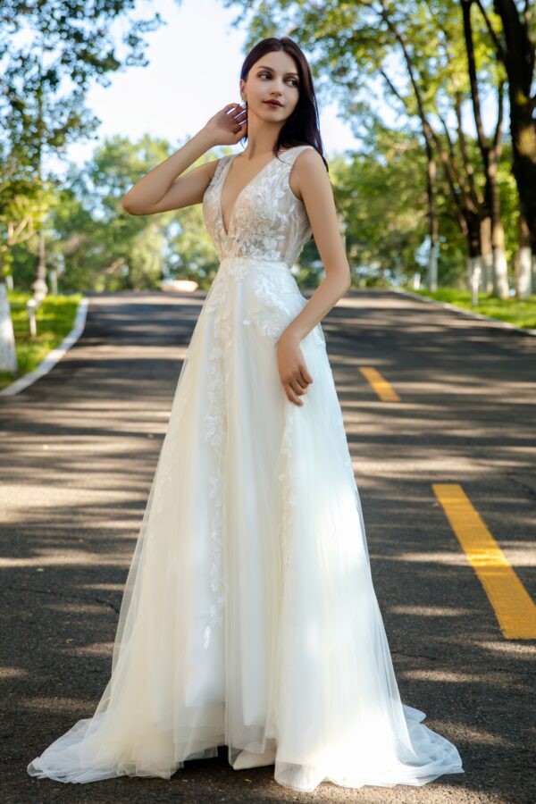 Effortless Grace Wedding Gown with V-Neckline and Ruched Bodice