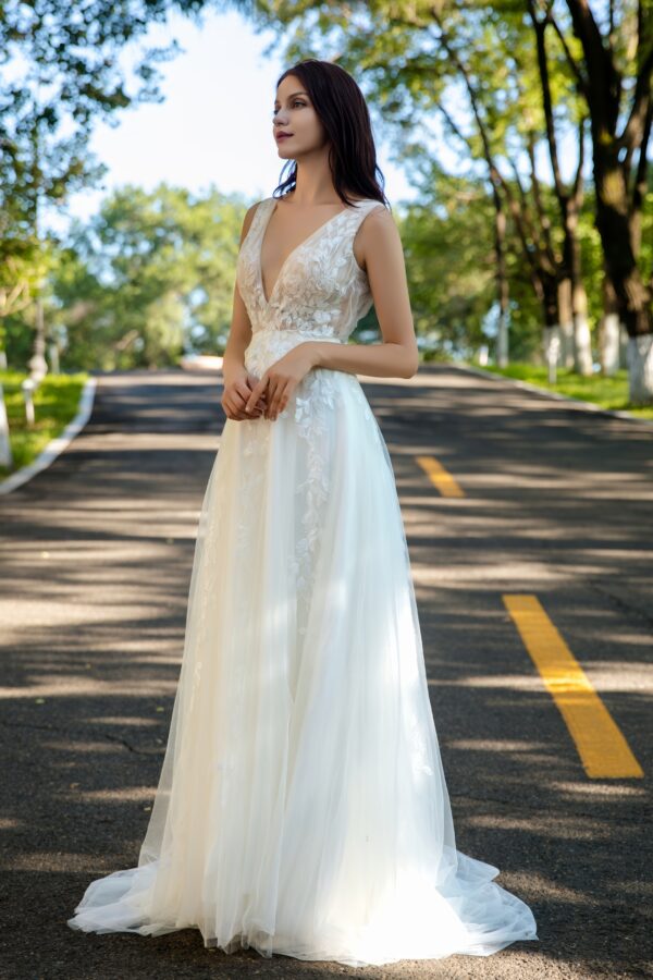 Effortless Grace Wedding Gown with V-Neckline and Ruched Bodice