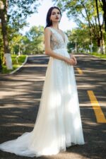 Effortless Grace Wedding Gown with V-Neckline and Ruched Bodice