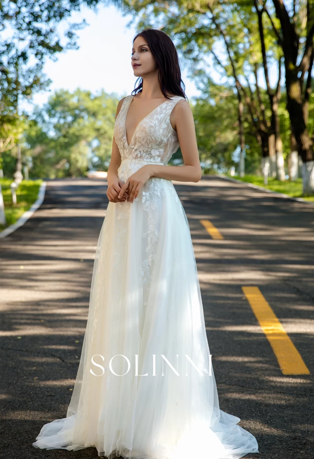 Effortless Grace Wedding Gown with V-Neckline and Ruched Bodice